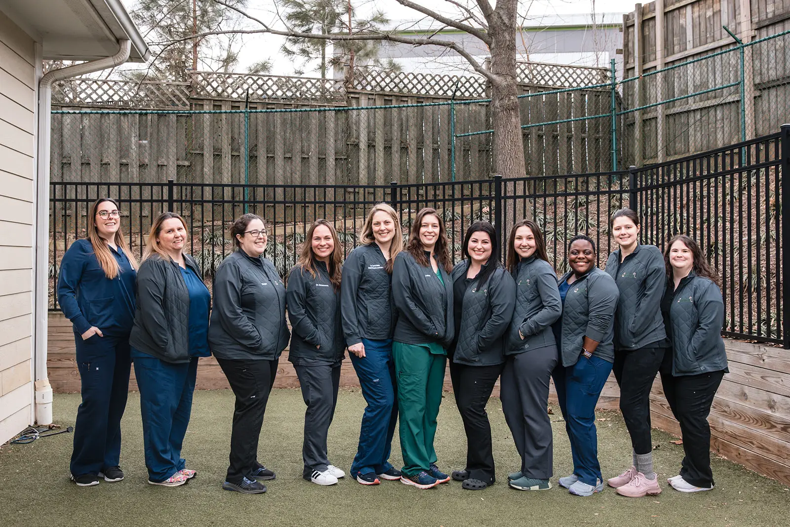 The staff of Hoffman Animal Hospital in Baltimore, MD gather for a group photo outside